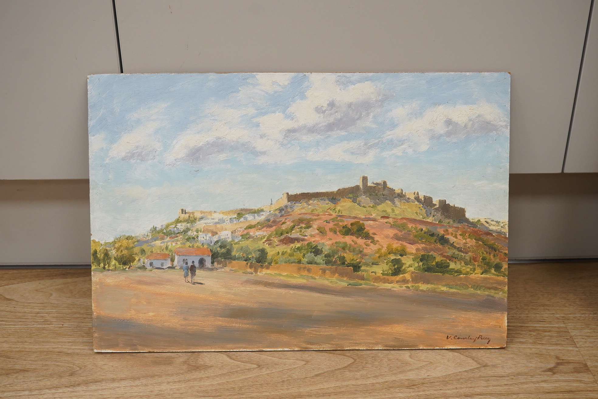 Victor Coverley-Price (1901-1988), oil on board, Landscape with walled city, signed, 30 x 46cm, unframed. Condition - good